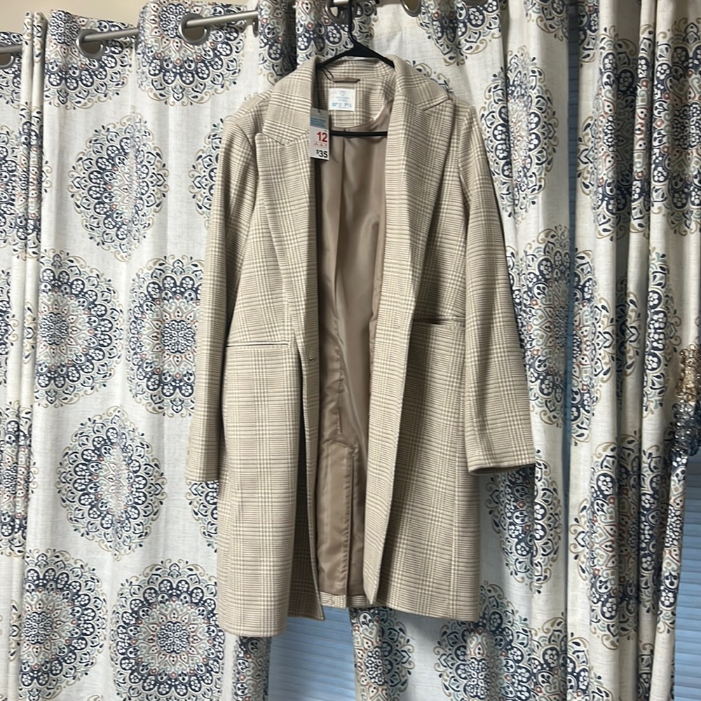 Medium plaid trench coat, never used